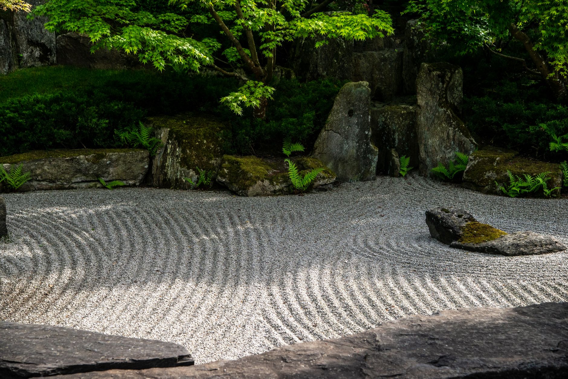 Traditional Japanese wooden temple courtyard garden